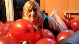 girl-balloon-popping-